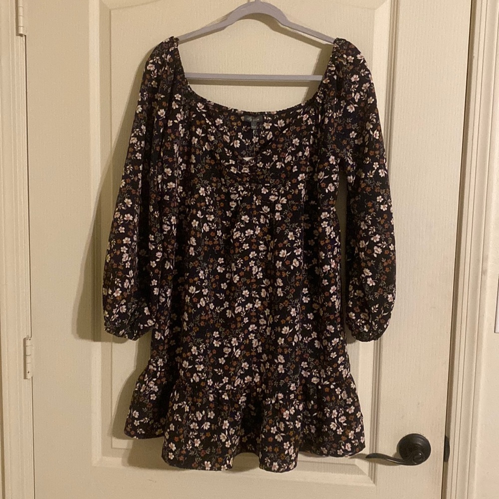 Floral black cream and rusty colored dress. Size large.